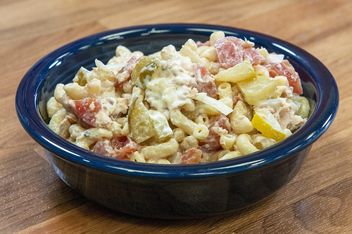 Macaroni salad in a bowl, a typical deli-counter salad